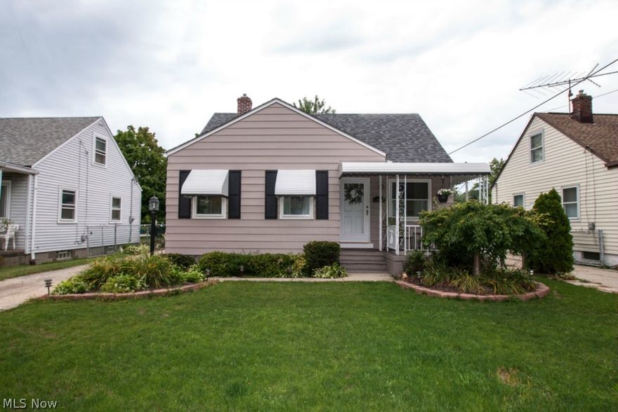 Come see this irresistible West Park bungalow just a short distance from the Metro Park! So many recent improvements inside and out! Welcoming open porch beckons you inside to crisp clean freshly painted interior with new fixtures throughout! Kitchen with newer easy care laminated floor includes complete appliance package! Cozy dining space open to living room creates an ideal space to entertain! Upstairs you will discover a roomy master suite featuring skylights, gleaming hardwood floors and custom built in dressers and bookcase! The full lower level with glass block windows includes a convenient half bath! The fully fenced yard includes an over sized 2.5 car garage, deck and patio perfect for summer gatherings! New a/c, windows, furnace, doors, roof, and more 2009! Home warranty included!