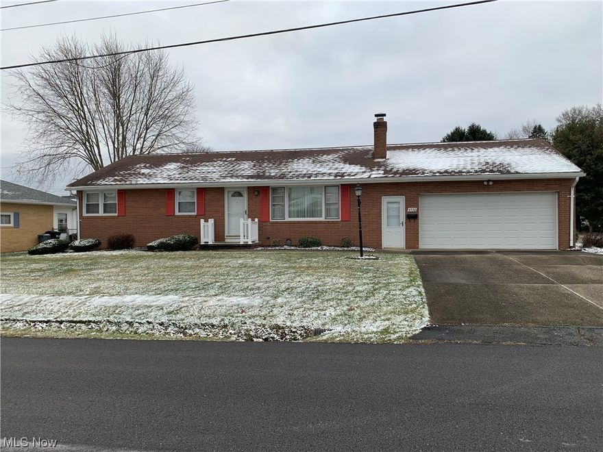 Solid and well kept three bedroom brick ranch in Perry Township. Eat-in kitchen with stove, refrigerator, and built-in microwave. Living room with a stone fireplace. One bath. Lower level is partially finished with a rec room and dry bar. Two car garage and outside patio. Perry Township Schools.