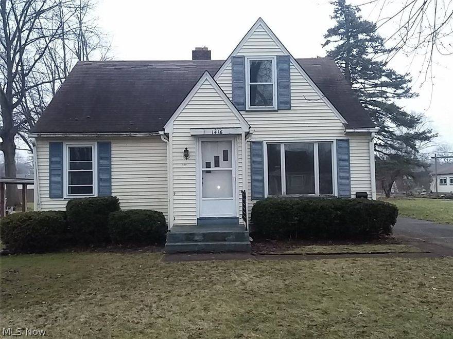 3 bedroom Cape Cod style home with 1 bedroom on first floor and 2 small bedrooms on second floor, full basement and 2 car detached garage.