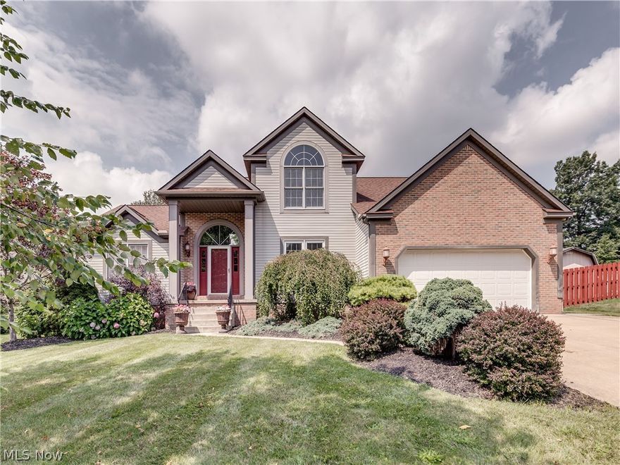 Where does one even begin with this sensational home! This 4 bed, 3 bath home in Uniontown is everything you've been dreaming of. From the tastefully landscaped yard, to the warm & cozy 2 story great room, you will be pleasantly surprised all around. The 2 story foyer and great room's centerpiece is the stunning masonry stone fireplace and soaring ceiling. The plush carpets, built-in bookshelf, and 2nd story balcony that overlooks this great room are just some of the amazing features. The impressive dining room features Pergo flooring and a large picture window that brings in tons of natural light. The master suite is conveniently located on the first floor for a complete first floor living space. The master bath features a walk-in closet, his/her sinks, soaker tub, stand up shower and ceramic tile flooring. The large eat-in kitchen showcases solid surface counter tops, peninsula island layout, ceiling fan, and ceramic tile floor. Situated on the 1st floor is also the utility/laundry r