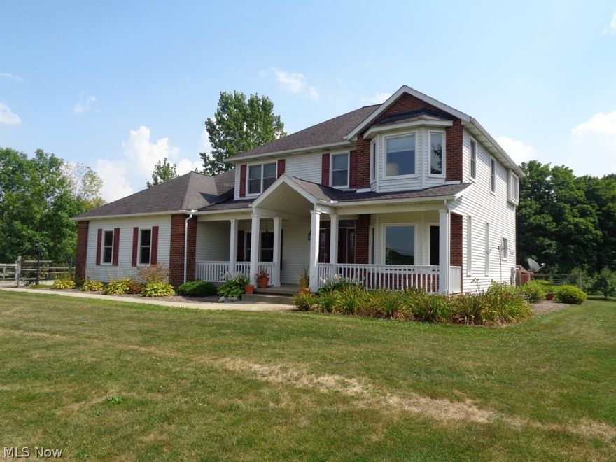 Welcome home! You'll fall in love with this 3BR/ 2.5 BA Colonial on 1.6 acres from the moment you step into in the spacious foyer. The wide open, contemporary style floor plan is perfect for family gatherings or entertaining friends. The year-round Sun Room with a wall of windows provides exceptional views of the small  orchard and the adjacent horse farm. Attention to detail is evident with the 1st floor 10' ceilings,  hardwood flooring , bay windows in DR & MBR, wood burning brick fireplace with/ raised hearth and built-in cabinets & bookcases on each side, abundance of recessed lighting and ceiling fans throughout,  second floor laundry room, beveled glass French doors in DR & beveled glass pocket doors in the Sun Room. Well appointed kitchen with loads of cupboard space and middle island is the cook's delight.  Inviting master suite boasts a  walk-in closet, luxury bath with steam shower, soaking tub and separate vanities. First floor office could possibly be a 4th bedroom. Enjoy t