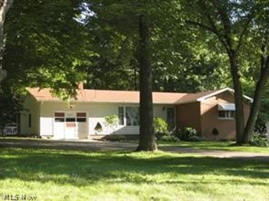 LAND CONTRACT CONSIDERED WITH $20K DOWN!  Great location in the heart of GREEN!  Green School District.  This three-bedroom, well-maintained ranch with a partially finished basement was recently painted and updated throughout.  It sits on approximately one (1) acre and has most of the backyard fenced in with vinyl fencing :)  Must see!  Agent is related to Seller :)