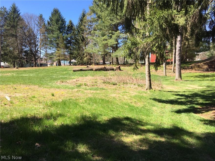 Gorgeous piece of land located in the Lake school district! This location is wonderfully convenient, just off 619 and Cleveland avenue, putting you close to the schools, Hartville and Green shopping areas, downtown North Canton and numerous golf courses! The lot has been cleared of all of the trees in the center, leaving a perfect run of mature trees along all four perimeters for privacy and a lovely view. The space allows for a multitude of home styles, including a walk-out basement! The neighborhood is a mix of newly built homes, farm houses to updated 50's & 60's ranches. All utilities are available at the street with the exception of sewer. A septic system would need added, perk test already complete. This parcel was recently combined to the current lot, but can be split back into 2 lots. Build one house or two! Please schedule showing prior to walking the property. ***Also listed and available as 2 separate lots/purchases.  Approval needed prior to walking the property.