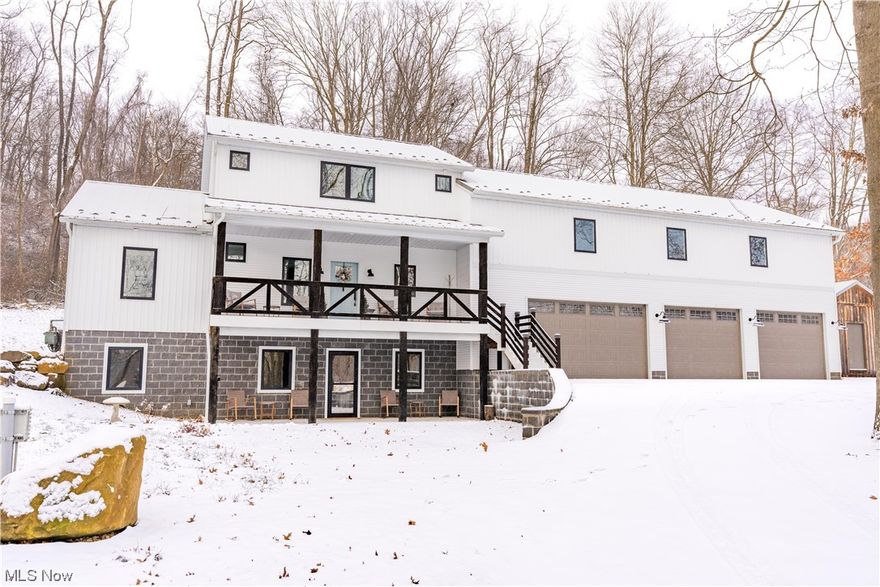 PREPARE TO FALL IN LOVE WITH YOUR NEW CUSTOM-BUILT MODERN FARMHOUSE! This home has it ALL and I mean ALL. Do you need additional, private space for in-laws? Do you seek your very own park-like sanctuary off the back deck? Do you dream of an immense, clean garage designed to house vehicles, boats, toys and more? Look no further because this home is it! Upon entry the main living area is uniquely designed to encompass the kitchen, dining and family space all in one spacious great room. Double-sided gas fireplace adds ambiance whether you are inside enjoying dinner or outside relaxing on the back deck. Stone counters highlight the gorgeous and bright kitchen. Entertain your guests or cozy up for movie night in your very own theater room; complete with bar and reclining movie theater style seats. You'll be amazed at the amount of storage space located off theater room with stairway access to garage. Maybe you need more living space? This 1000 sq. ft. storage room could also be converted! The lower level is yet another feature that will knock your socks off! Mom and Dad will love the private living suite complete with laundry, fully applianced kitchen and separate garage access. Bonus room is used as second bedroom. This home is what many dream and now it can be yours. Garage is extra deep, has 12' ceilings with hot/cold water, three drains, measures approx. 1620 sq. ft. and is heated. Andersen windows adorned with window treatments stay. Extra storage is available with 15x22 oak shed. Smart thermostat with four zones make programming your comfort level a breeze! Spring-fed pond stocked with fish adorns the side yard, while plenty of mature trees in back yard give sought-after privacy! You'll never know Route 21, shopping  and all amenities are minutes away when you are surrounded with the natural beauty of 13908 Calaboone Rd!