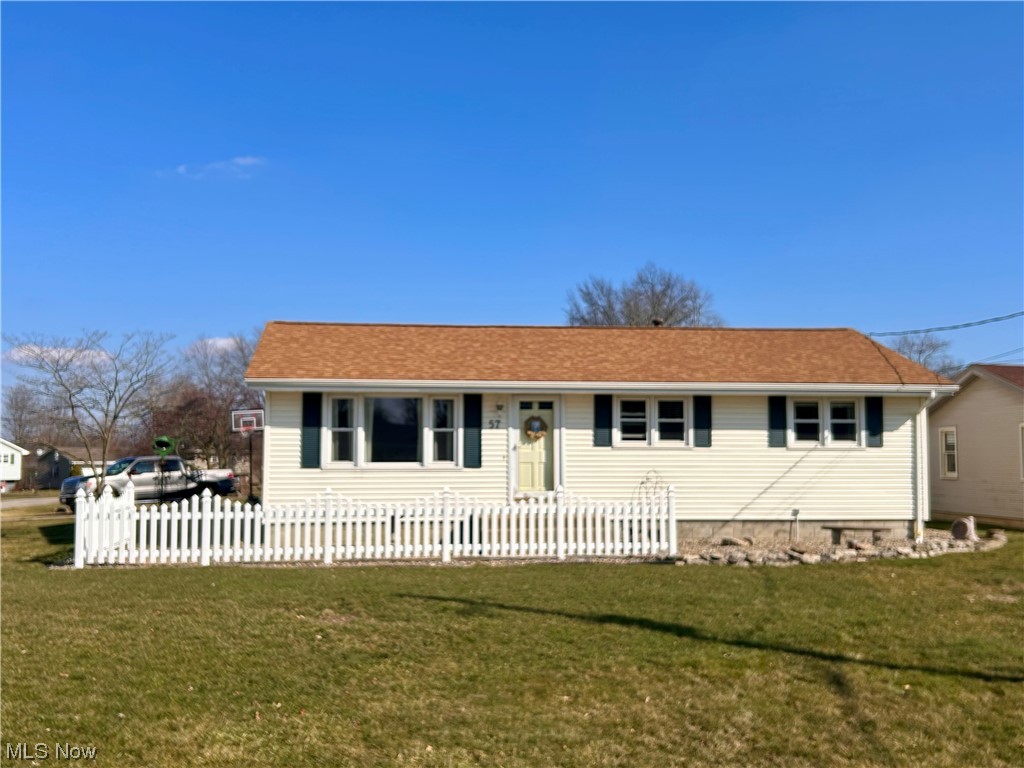 Immaculate three bedroom ranch Home located on a corner lot in Springfield Schools. This home has been carefully cared for and maintained. Updates include new roof (2019) Furnace & HW tank(2019) Basement was waterproofed (2023) with Nu-Air Exchange unit and includes both sump pump and back up sump pumps with battery backup. Large eat in kitchen refreshed with white hardwood cabinets and new hardware with amazing natural light throughout. Additions include large family room with beautiful brick gas log fireplace (electric unit does not stay) featuring first floor laundry tucked away behind louver doors making first floor living a breeze. The two car garage is not only insulated, but it has been finished with drywall and gas heater -including both hot and cold water hookups! There are three bedrooms on the first floor and a large living room/sitting room...all freshly painted and bedrooms all include double closets. Newer Vinyl windows and glass block in basement. Updated lighting with dimers in most rooms. Tons of storage! Additional living space in the basement. Completely open and ready to be finished including a half bath with new toilet and plumbed for shower. Basement laundry with laundry chute from hall upstairs, both washer and dryer convey. Enjoy the outdoors with a large wooden deck that leads to both a covered porch and paver patio. Large side yard has fire pit that stays. Nothing left to do but move in!