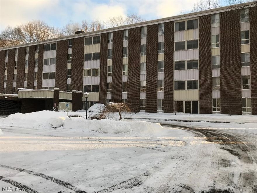 Sought after "first floor" walk out condo in Building C.  Freshly painted throughout and gleaming clean!  Enjoy the view as you enter the 3 season sun room that walks out to the patio! You'll love the cozy eating space in the fully applianced kitchen as well as a dining "L" perfect for entertaining just steps away. the dining area opens into the inviting living room.  Updates include bath, flooring and ceramic tile. The unit includes an assigned garage space and separate storage room.  The community features a party room, guest suites, an outdoor heated pool, clubhouse,  exercise room, craft room, bocce ball court and more.  The condo fee includes all the utilities and basic cable.