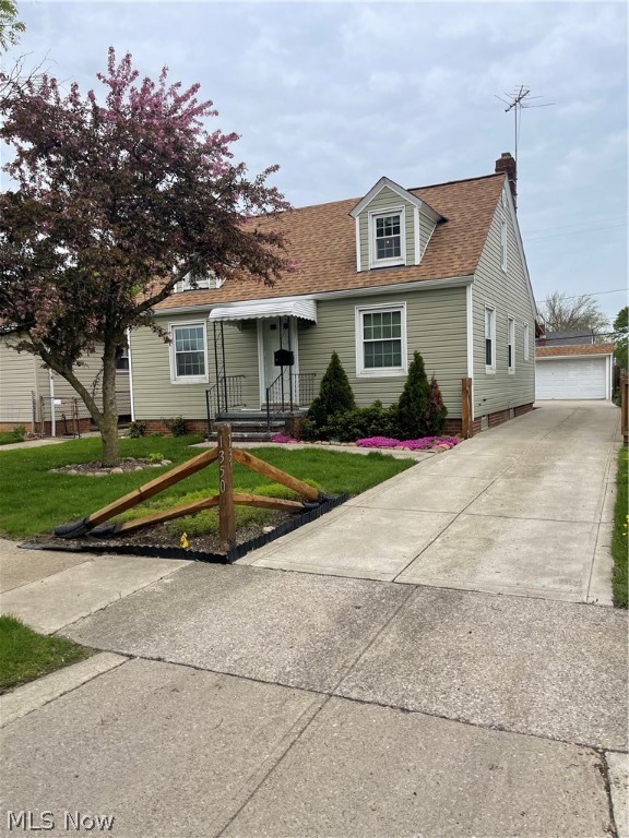 You will be very impressed with this Westside Gem! With a vision for detail this home is beautifully landscaped front and back and waiting to entertain. Nice size living space and dining area hard wood floors, two bedrooms and full bath on first level. Bathroom has had a recent update 2022. new tub surround, vanity and toilet. Second floor third bedroom is spacious and inviting living at its finest, newly installed carpet and freshly painted to complete 2022. Kitchen has newly installed countertop and hardware to add to the appeal. Roof replaced 2016, New siding 2015, New Concrete driveway 2015. New garage door and opener 2014, Drain tile replaced 2016. There is a full unfinished basement with a additional full bath waiting for your vision.