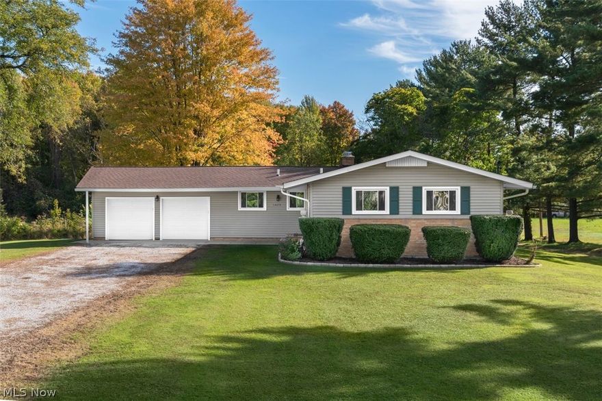 Welcome home to this completely renovated ranch in the heart of Hinckley! This striking 3 bedroom, 2 bath home features an open concept floor plan, wet bar, and picturesque backyard with a pond. Beautiful wood-look floors flow from the bedrooms into the updated eat-in kitchen, which features an quartz counters, stainless appliance package, tile back splash, new cabinetry and an eat-in area that overlooks the family room. The living room has a cozy fireplace and a wall of windows that frame the backyard. Entertain by the wet bar, which features matching quartz counters to the kitchen, tile back splash, and built in wine racks. Three spacious bedrooms complete the first level, all with ample closet space. Both full bathrooms have been completely renovated, included over-sized full bath in the front of the home with large tile shower, glass block, new floors and vanity. The walk out basement makes for great storage, and can be easily finished if desired. The completely private yard sits o