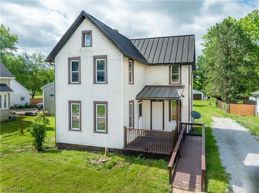 Welcome to this recently updated home featuring over 1,200 sq ft on a .54 acre lot with fresh colors, and plenty of natural light throughout. This charming home offers an Inviting covered front porch that is great for entertaining and relaxing. You'll love how bright, airy, and spacious it feels as you enter this home. The great room has a modern color palette, an abundance of natural light, and updated floors. Open to the great room is the formal dining room with tall windows. Off the dining room is a full bath with a tiled shower and washer & dryer hookups. The kitchen offers plenty of cabinets, a stainless steel sink, and access to the covered back deck. The private backyard is great for enjoying the outdoors. The 2nd floor has three bedrooms, a large full bath with a standing shower, and access to the partially finished attic ideal for an office space, playroom, or storage. The unfinished basement has a walk-out to the backyard and offers even more storage space. Completing the package is the detached 3-car garage. Make an appointment for your private showing today!
