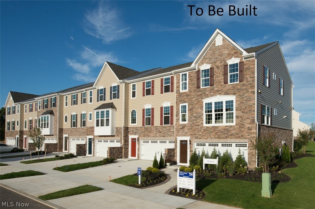 Whether you're looking for your first home or want brand new everything, you can find it at Towns at Steels Corners in Northern Cuyahoga Falls! Plus, with landscaping installed and lawn and snow care provided, spend more time doing the fun things! Plus, area shopping, restaurants, and recreation are conveniently close by! The Wexford townhome floorplan with open-concept main level provides a modern multi-level layout that adds excitement to daily living! This home has the 4 foot extension with an oversized kitchen island creates the perfect command center for cocktails and snacks, meal prep, or getting a little work out of the way! Upstairs you will find 3 bedrooms and the convenient laundry area. Your owner's suite has been outfitted for luxury with a wardrobe-sized walk-in closet and dual vanity en suite and a Roman shower with ceramic surround ! There is finished Rec Room pace on the lower level for even more living space. To Be Built. Photos for representation only.