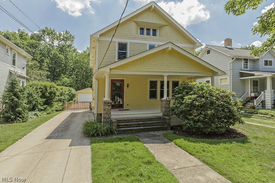 Front porch swing on charming Village colonial.  Open first floor with hickory floor and abundant built-ins.  Spacious master bedroom, two additional bedrooms, full bath with shower and tub complete the second floor.  Two car garage and concrete driveway.  Fenced yard.  Many improvements – 2014:  interior and exterior painted, carpet on second floor – 2010: hickory wood floors on first floor – 2005: roof, windows, attic insulation, living room cabinets – 1997:  exterior basement waterproofing – 1996: garage, driveway. Captivating walk on tree lined sidewalks to downtown with ice cream, parks, boutiques, library and historic buildings.