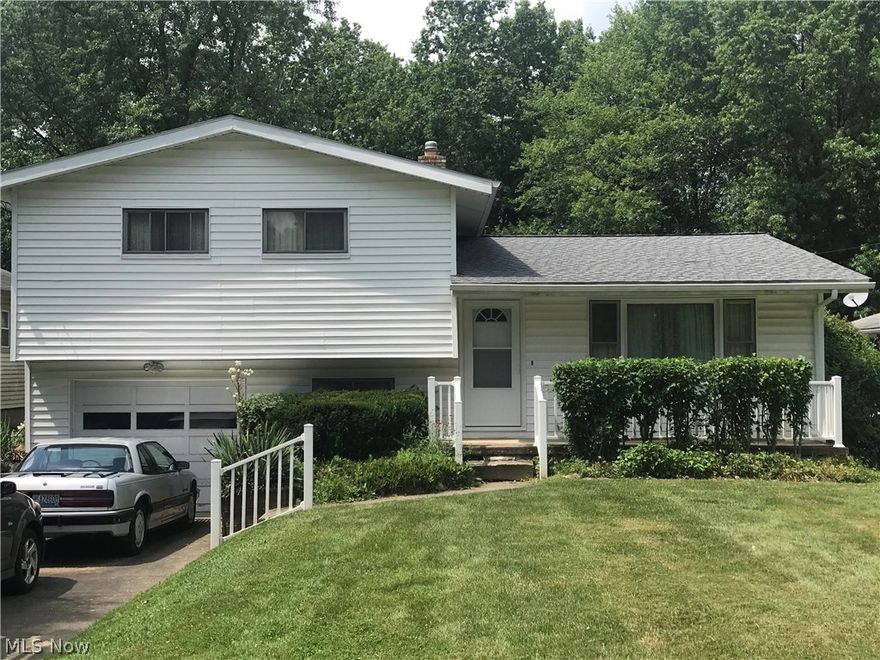 Welcome yourself home to this 3 bedroom, 2 bath Multi-Level home. Main floor features spacious Living Room, Kitchen, and Formal Dining Room. Second floor houses all 3 bedrooms and a Full Bathroom. Beautiful Hardwood Floors under carpeting- which has just been professionally cleaned. Lower level features a Family Room with a beautiful brick gas fireplace as the focal point. Lower level also includes a possible 4th bedroom or large office and a storage room equipped with lots of shelving. All appliances are staying! Roof and siding are approximately 5 years old. White vinyl fencing in the front of the house is approximately 4 years old. New toilet in 2nd story bathroom. Newer Hot Water Tank. Concrete Patio perfect for entertaining at the back of the house with private, scenic backyard which extends past the creek. Rose bushes run along one side of property. Garage has additional area for storage and work space. Home is being sold "as is". Seller is offered Basic 2-10 Home Warranty Plan!