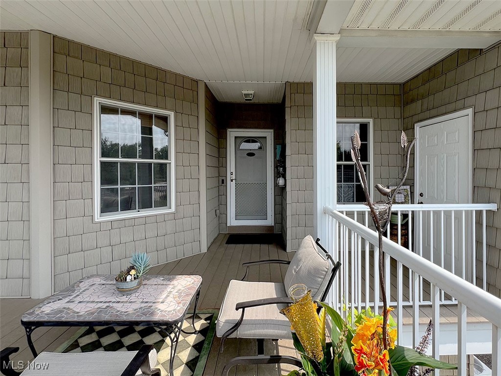 Experience luxurious lakefront living in this beautifully appointed 2-bedroom, 2-bathroom corner condo located in the highly sought-after Vermilion Shores community on the shores of Lake Erie. This primely located condo boasts breathtaking panoramic views of the Lake from nearly every room, with a covered balcony overlooking the community's private beach. Enjoy an open-concept floor plan featuring rich hardwood floors throughout the living areas and bedrooms. Custom cabinetry, quartz countertops, and high-end stainless-steel appliances are some of the features of the well-appointed kitchen. The family room is anchored by a cozy gas fireplace, trey lighted ceilings, bay windows and expansive glass sliders that open to a covered balcony—perfect for relaxing or entertaining with unobstructed water views from sunrise to sunset. The spacious primary suite also features its own glass slider to the balcony, allowing you to wake up to spectacular sunrises over Lake Erie. Residents of Vermilion Shores enjoy a host of resort-style amenities, including a private beach, heated pool, tennis and pickleball courts, clubhouse, fitness center, and an exclusive 2000 ft. lakefront walking path. Whether you're looking for a year-round home or a weekend retreat, this rare lakefront gem offers the ultimate blend of comfort, elegance, and coastal charm. Close to downtown Vermilion, medical facilities, major highways, and much more. Don't wait-come and start enjoying the lakeside life...you will be glad you did!