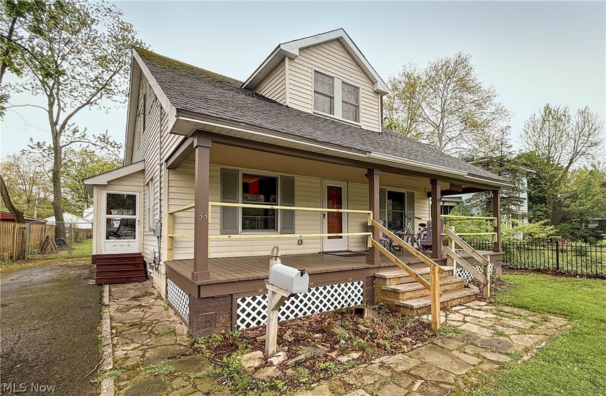 Enjoy the summer evenings on the front porch of 33 Henry Street a 3 bedroom 2 full bath Cape Cod with an exceptionally large fenced in back yard! Enjoy gathering in the large kitchen with plenty of space for a kitchen table. The dining room has access to the new Trex deck (2025) and a shed with plenty of storage space. Back to the spacious living room and den with fireplace both with original wood floors, den also has access to kitchen. Full bathroom on first floor. Up the stairs to the 3 bedrooms with full bath. There is also an additional front entrance with plenty of space to hang coats. Located in the basement is the laundry and a with plenty of storage space and a work room.  Home Warranty included.