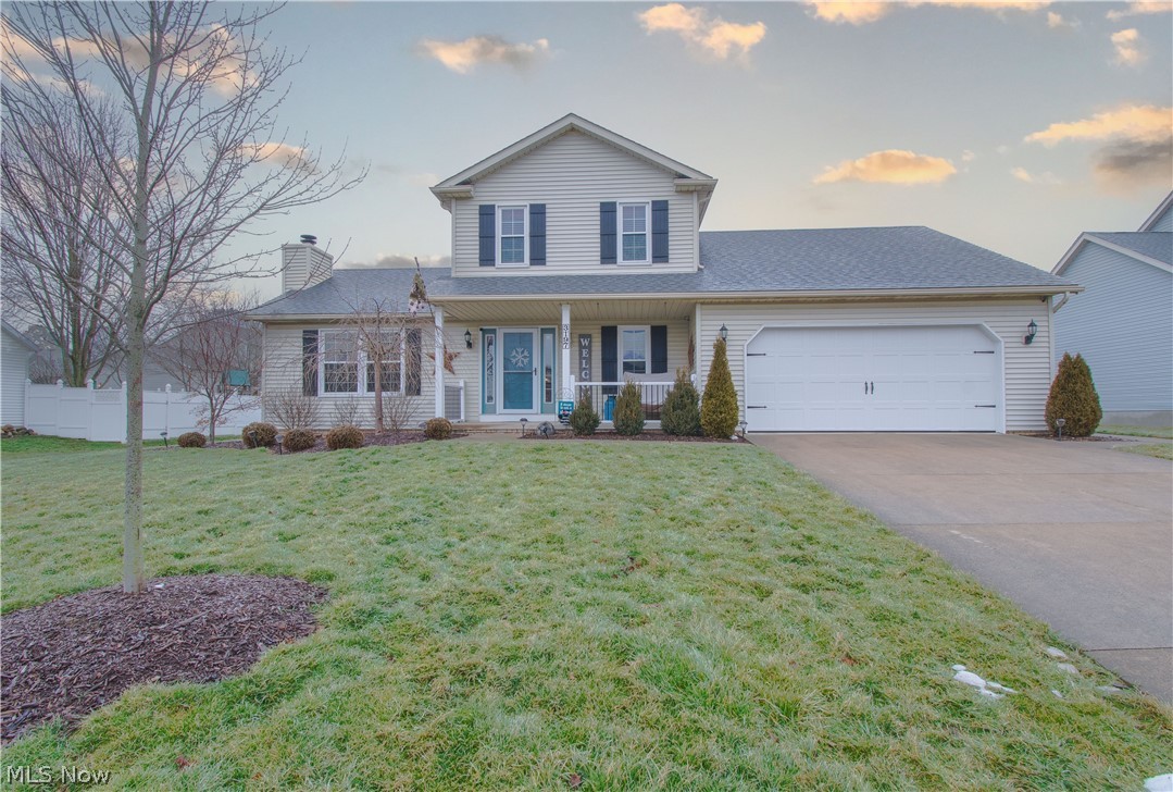 This fantastic home is located in the desirable Greentree neighborhood in North Canton Schools! The welcoming front porch invites you into this beautifully updated open floor plan home with over 2,500 sq ft of living space. The vaulted ceiling great room w a beautiful hearth brick fireplace (white mantel) and eat-in kitchen centrally located make this home perfect for entertaining. The kitchen has been upgraded w stainless appliances, white cabinets accented w a gorgeous ceramic tile backsplash, Corian countertops, a breakfast bar, a pantry, and a dinette area w sliding doors leading to the carefree composite deck. The 1st-floor owner's bedroom is complete w a private bathroom w a soaker tub, walk-in shower, and a walk-in closet. A half bath and laundry are also conveniently located on the main floor. Upstairs are two bedrooms & a shared bath w a skylight. Additional 768 sq ft of finished living space in the basement offers a rec room and a bonus room (possibly 4th bedroom/office/or pl