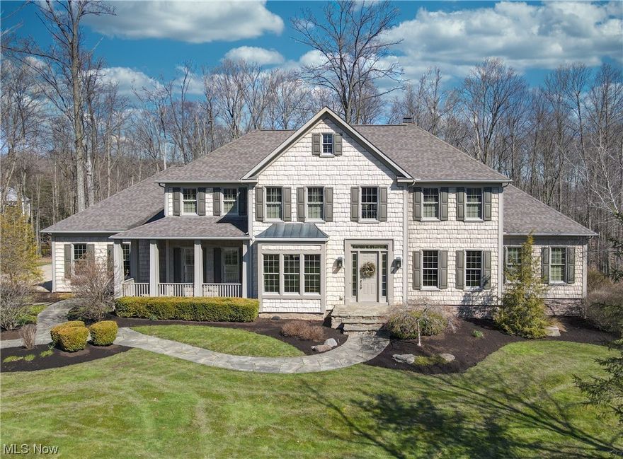 Nestled at the end of a private cul-de-sac, this custom-built home offers an abundance of space, wooded views and fantastic updates. Step inside and you'll immediately notice the attention to detail and craftsmanship. The open floor plan flows seamlessly from room to room, with hardwood floors, millwork and 10 ft ceilings throughout. The heart of the home is the large, updated kitchen, complete with stainless steel appliances, granite countertops, and beautiful cherry wood cabinets. The eat-in kitchen looks over views of the back yard. The formal dining room includes access to front patio and large windows. The two story great room looks out onto wooded exterior and includes wood burning fireplace. An oversized owner’s suite is a true oasis and features double entry doors, an abundance of windows + custom plantation treatments, a large walk-in closet with windows + built-ins and spacious bathroom with dual vanities. The upper level includes three well sized bedrooms + two full baths. O