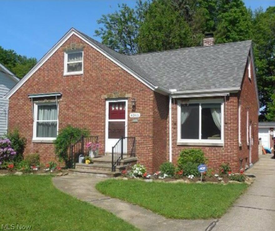 Lovely 3 bedroom bath and a half brick bungalow for sale in a great location with wonderful neighbors. Located between Rt.480 and Rt.90 (easy access to),also in between 2 great shopping centers Great Northern Mall and West Gate shopping center,all the stores, everything you need and great food places near by also. Everything you need within minutes to get to. Also near parks and a very good recreational center. The house has a new roof(2012),chimney re-tucked and pointed(2012),new windows(2013),new appliances,microwave and dishwasher(2013),fridge(2012),washer and dryer(2011),gas stove(2010),kitchen countertops,sink,faucet(2013),kitchen tile(2012),bathroom tile,tub/shower,sink,toilet(2010). Hardwood floors in the bedrooms,hallway,living room.Living room and hallway hardwood floors refinished(2013). Hot water tank,furnace,a.c. is 10 years old. Furnace ducts were cleaned(2012). Basement half finished with wet bar and the other half is a laundry room. All the electrical is updated(2002) wi