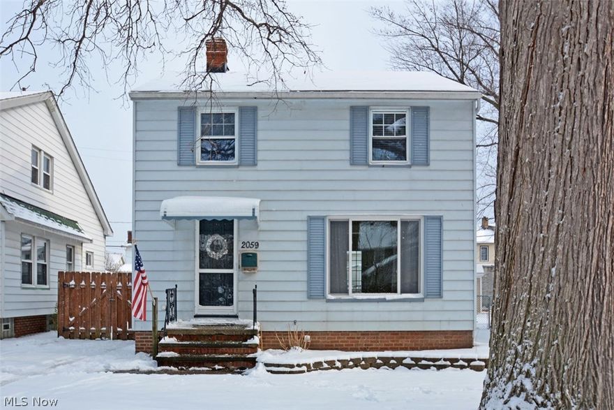 Darling starter colonial on wonderful tree-lined street surrounded by child-and-pet-friendly yard with privacy fence.  New roof, front window, dishwasher and awning all done in 2015.  Updated kitchen cabinets, counter, flooring and disposal as well as AC all new in 2010.  Hardwood floors throughout, freshly painted, walk-out to huge custom deck with hot tub.  Full basement with laundry area.  Nice 2-car garage with good storage.  Great home looking for its next owner.  New microwave over stove 2016.