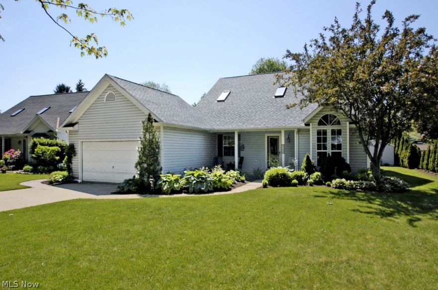 Magnificent...remarkable...breathtaking...this one of a kind, custom home will appeal to the most discerning of buyers. The moment you step through the front door you will be absolutely astounded by the soaring ceilings and wide open, modern floor plan. The large open kitchen - with two story vaulted ceilings and a bountiful array of natural sunlight - provides plenty of room for the chef in the family to cook their favorite recipes while engaging in casual conversations with family and friends. Over-sized family room is large, yet cozy. Here you will find amenities like no other, including wood burning fireplace for snuggling up on cold winter nights as well as a bar for entertaining. Just a short stroll upstairs leads to the sumptuous owners' retreat boasting a large walk-in closet, and the luxurious private bath featuring a double bowl vanity, shower and a jetted soaking tub. Outside, peace and tranquility await you on the large custom deck attached to beautiful stamped concrete pat