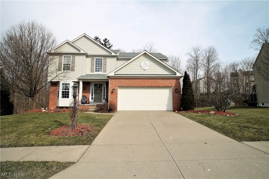 Pristine beauty in this charming four bedroom, two full and half bath colonial home. Come on inside to the open & bright foyer, dining room with large window, & the first floor offers luxury vinyl flooring (2019). Family room offers a gas fireplace, large windows, & just flows seamlessly to the eat in kitchen area. Eat in area has a slider to let the natural light shine through & opens to the fabulous, large deck. The large open kitchen has stainless steel appliances, new dishwasher (2019), garbage disposal (2019), new kitchen faucet (2019), abundant of cabinets & counter space with island & view of the spacious backyard from the window over the stainless steel sink. Laundry room & the half bath finishes the first floor. Upstairs you will find four large size bedrooms & a hall bathroom. Master suite has vaulted ceilings, large master bath with double sinks, soaking tub, shower & walk in closet. Lower level has half finished space & is rough plumbed for a bathroom, has garden windows. L