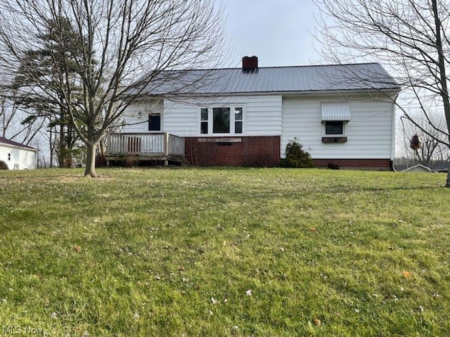 Ranch home on basement. 3 bedrooms, 1 bath.  Updates: kitchen, bath, windows, roof, furnace, central air, breaker box. 
Oversized two-car detached garage and 1 car garage in basement. Corner lot. City water and a septic.