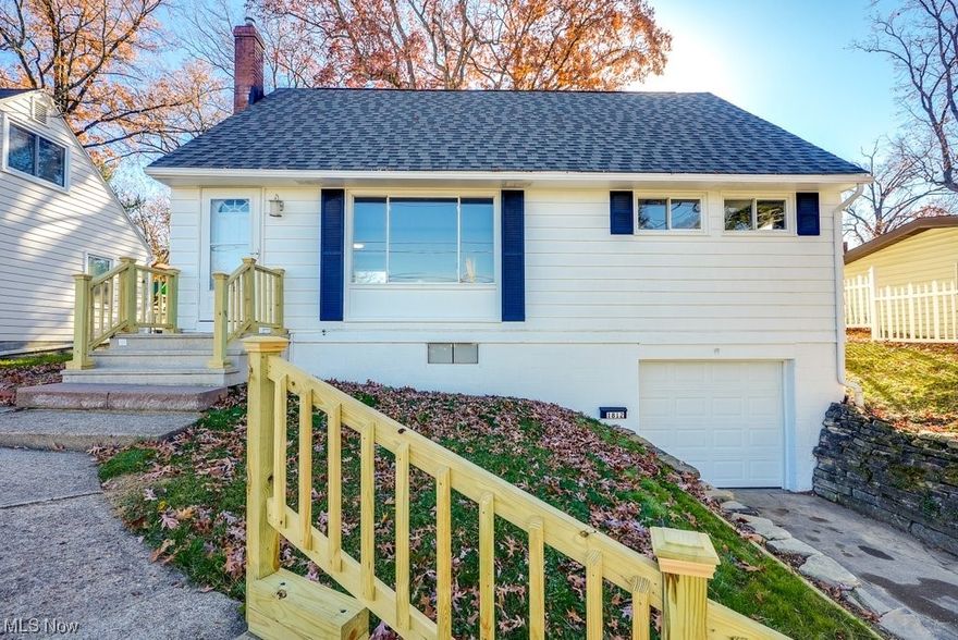 Welcome to 1812 Schiller Avenue, a beautifully updated home nestled in a prime location. The open-concept design of this home creates a seamless flow between the living room, dining area, and kitchen. Large windows provide plenty of natural light. The kitchen boasts brand new cabinets, granite countertops, and all new appliances. The first floor features two bedrooms, a completely remodeled full bathroom, and hardwood floors throughout. The upper level is a large bedroom with a walk-in closet. The basement is finished and provides access to an attached oversized garage. Enjoy your evenings on the large covered porch looking out to a large fully fenced backyard. This home comes with plenty of updates , such as the roof (2023), exterior paint (2023), garage door (2023), vinyl fence (2023). walkway to front porch (2023). appliances (2023), countertops (2023), and MORE! The location of this home is excellent, conveniently located close to shopping, dining, parks, schools, and highway access, and within walking distance to Portage Crossings! Don't miss the opportunity to make this beautiful home yours!