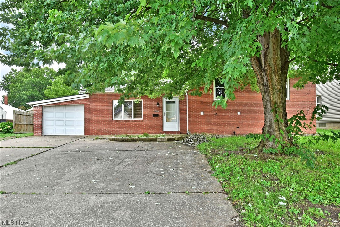 This charming split-level home features a spacious living area, updated kitchen with appliances, and garage access on the main floor. Second level you will find three comfortable bedrooms and updated bathroom. Lower level hosts a large bonus room and additional bathroom along with multiple closets and extra storage space. Lovely brick exterior offers low maintenance and curb appeal. New furnace, central air, windows, and roof are just a few of the many updates recently done. Come check out this move in ready gem located in Warren close to all of your shopping and all dining needs.
