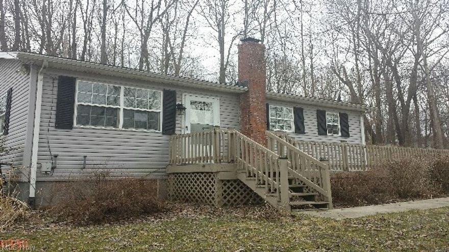 Welcome Home!Fantastic Investment potential, a must see to appreciate. This 2 bedroom ranch offers a large kitchen with tons of cabinets, formal dining room with French doors of living room, first floor laundry with access off front porch for those muddy snowy days. Freshly painted, new carpet, the roof ws replaced in 2014 many additional updates. Large 1.3 acre yard a gardeners paradise, private setting, 2 car detached garage. Easy to show!