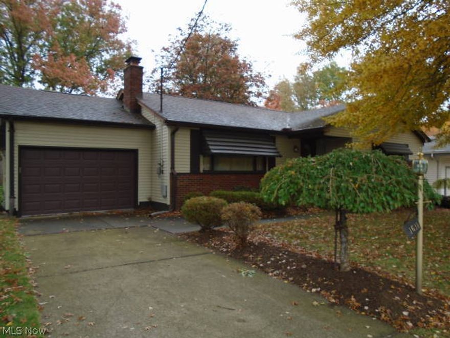 One owner spacious ranch, New family room on the back has been completely remodel, with  wood burning fireplace, french doors that lead to a great sun room with all new windows , private back yard. Large eat in Kitchen, tons of counter space, formal living room with fireplace all bedrooms and living room have hard wood floors under carpet. All new windows thru out. Electric, hot water tank have been updates. Large basement with half bath waiting for someone to put their special touch. Garage is a single car from outside  but it is double inside back to back . Lots of storage thru out and woodwork is in great condition. LAND CONTRACT TERMS CALL AGENT FOR INFO