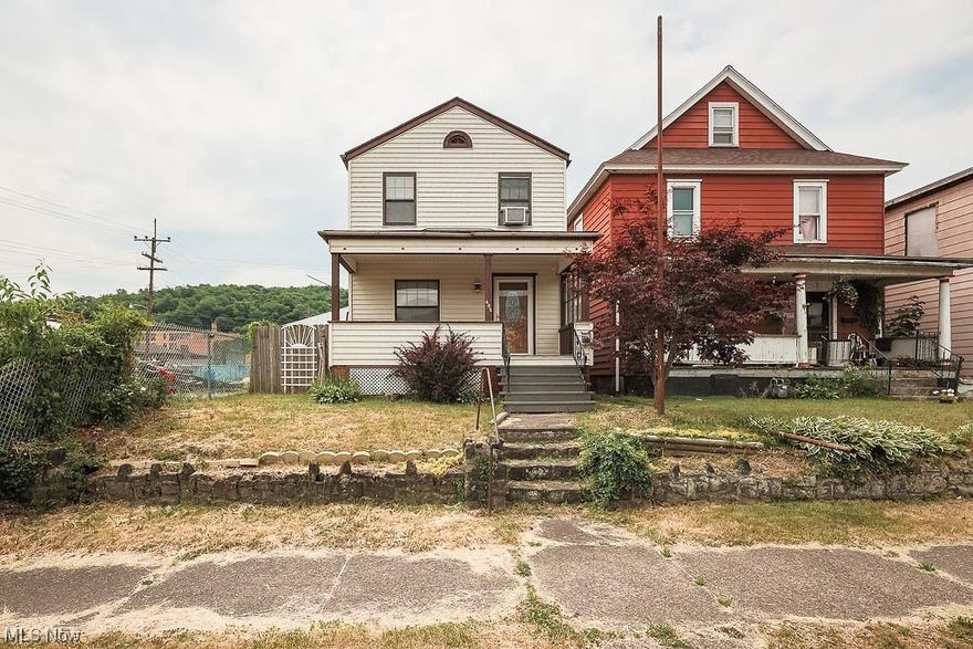 This beautiful home offers all the comforts for less than rent.  Enjoy being social on the front porch or relax in the privacy of the back porch.  There is a big eat in kitchen as well as a bath and a half and a first floor laundry room.  And for the car enthusiast there is an oversized two car garage.

The multi-list is not populating the correct school districts.  The correct School district is Hancock County Schools in WV  - Oak Glen School district.