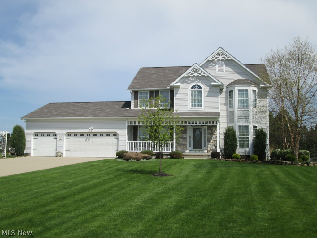 Three car garage, 2005 Curran Brothers built home. Minutes from the Square but feels like the country. Home has been meticulously maintained in and out, you will be proud to call this your new home. Decorated in today's colors. From the moment you enter the front door you are drawn in to see more. Large foyer with curved stairs greets you. 9 ft ceilings with crown moldings, extra wide baseboards and curved archways on main floor. Formal DR has trey ceiling, Formal LR and FR, MB have bay windows. Gas fireplace in FR. Two round columns separate the FR and kitchen. Kitchen has upgraded sink, some glass front cabinets, ceramic tile backsplash and counters with island perfect for family gatherings. Hardwood flrs in FR, foyer and upstairs hallway. First floor laundry and yes, appliances stay too! Slider off kitchen leads you to a covered back porch to relax and enjoy the full fenced landscaped yard with storage shed. Partially finished bsmt has glass block windows, neutral carpet and offers