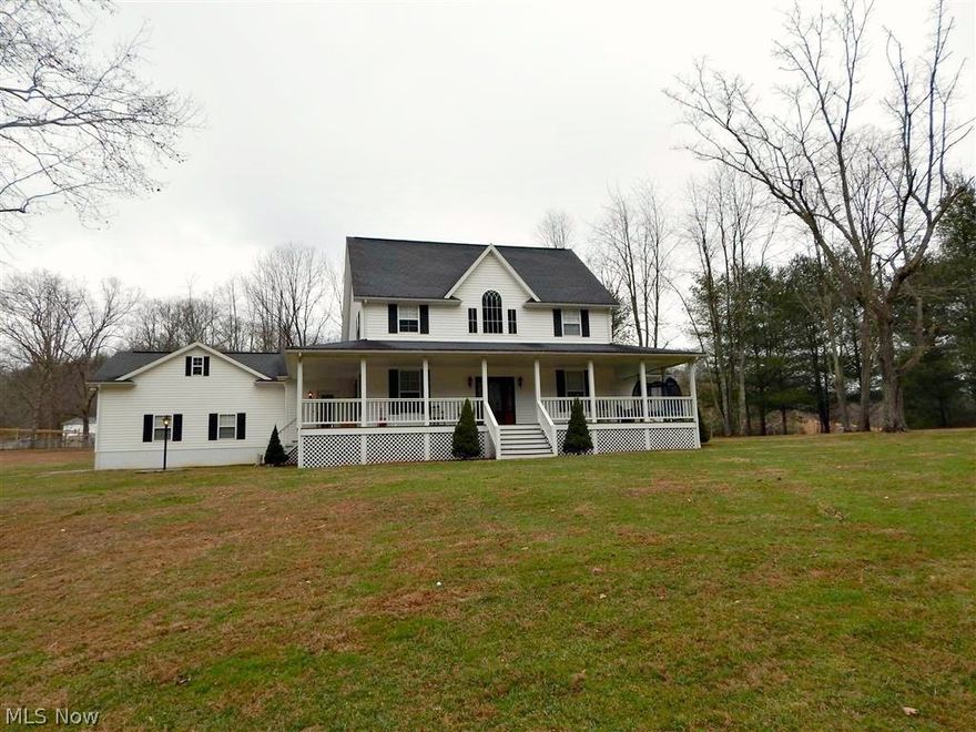 4 BEDROOM, 4 BATH HOME 4 YOU!
This magnificent 4 bedroom, 4 full bath home with attached 2 stall garage sets on 2.5 acres that offers plenty of room for out-door play at any age!  As you round the bend, this home catches your eye!  Traveling up the drive, you can instantly imagine yourself setting on the front porch, sipping on your morning coffee, watching the wild life that comes and goes.  Walking through the front door, the gleaming hardwoods and open foyer welcomes you to its warm and inviting color palette and tasteful updates, making you feel right at home!  The fireplace is a focal point in both, the living room and family room, adding to the overall warm feel of this home.  Just off the foyer, French doors open to a nice office area so you can also work in the comfort of your own home! The well equipped kitchen glistens with new Kenmore Elite stainless appliances, quartz counter tops with a copper farmhouse sink, an island & loads of cabinets!  This kitchen has views into the
