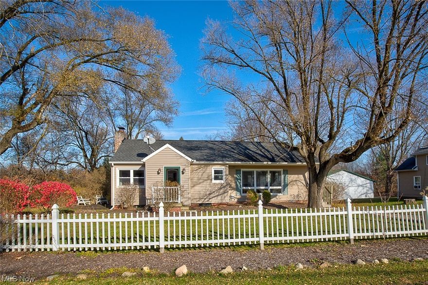 Enjoy Christmas in your new home. THREE BEDROOM RANCH IN HARTVILLE! Spacious updated kitchen with stainless steel appliances, stone backsplash, white cabinets and a large center island! The living room is open to the kitchen and features a stunning stone wood burning fireplace with a beautiful wood mantel. There’s additional space in the family room that has a wall of windows for tons of natural light! Down the hall there are three bedrooms and a nicely updated full bath. Full unfinished basement ideal for storage and laundry and access to the single car garage. Large deck overlooking beautiful backyard that’s over a half-acre and features two storage sheds. Updates include: Furnace 2018, A/C 2018, Whole House Humidifier 2019, Well pump 2018, well pressure tank 2020, new blown-in insulation in the attic 2016, Water Softener 2014, Hot water tank 2014 New carpet in Family room and new flooring in bathroom. Nothing to do , but move in.