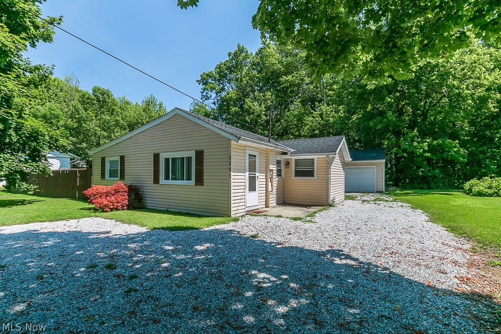 Rare two-parcel lot opportunity with deeded access to Lake Erie! Beautifully updated with a newer kitchen, updated bathrooms, and newer windows! Large detached garage! Don't miss out on making this beautiful home yours!
