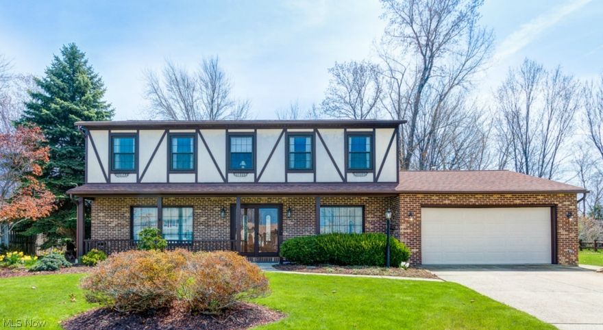 Located in Waterview Estates on a quiet cul-de-sac,  this beautiful, 4 bedroom, 2.5 bath Colonial is priced to SELL! This wonderfully well-kept home features an open concept, eat-in kitchen that opens to the living room showcasing a gorgeous fireplace. In addition, this home features neutral carpeting and decor throughout, a first floor laundry room and first floor half-bath, as well as a spacious sitting room and dining room. Upstairs, the large front bedrooms provide excellent, year-round views of Lake Erie, while the owner's suite and fourth bedroom overlook the private, partially fenced-in backyard. The owner's suite has significant closet space and recently updated private, full bathroom. With a roomy, enclosed sun room in the back and a sizeable front porch, this home is perfect for entertaining or watching Lake Erie sunrises. Other features include an attached 2 car garage with extra storage space, newer windows and light fixtures, and newer furnace, air conditioning, and hot wa