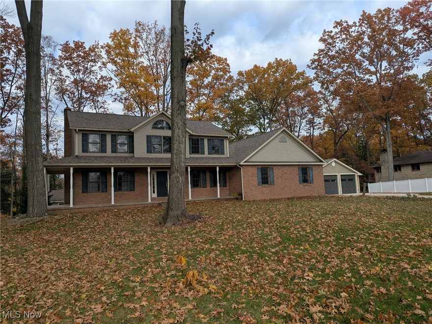 Rare opportunity in Springfield Township—this 6-bedroom, 4-bath Colonial is designed for those who need extra space and versatility. The property features a 5-car garage, two full indoor kitchens plus an outdoor kitchen, and multiple gathering spaces inside and out. The main kitchen opens to a 25’x15’ deck overlooking the backyard, while the finished walkout lower level offers a complete second living area or entertainment space with direct access to a 24’x23’ patio. Outdoors you’ll find an in-ground pool (needs work), pool house, and playhouse with electricity. Set on 1.08 wooded acres on a shared, private driveway, which serves only four other homes, this is an ideal setting for those who value privacy and function. Whether you need room for extended family, hobbies, or entertaining, this home delivers unique amenities rarely found in one property.