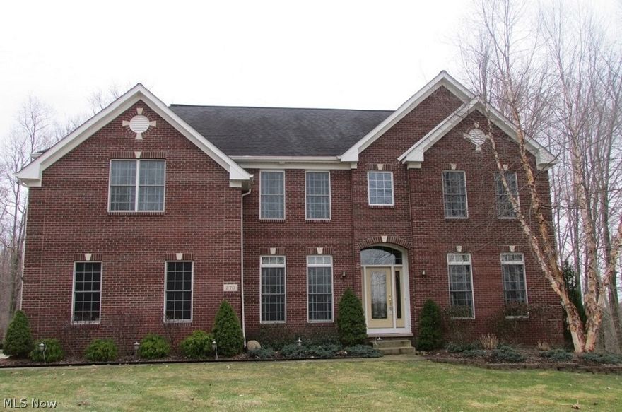 Impeccable, like new, beautiful custom Colonial on a .89 acre lot. Two story foyer, formal living room, dining room and office with excellent architectural details. Gourmet eat in kitchen features hardwood floors, granite counter tops, large dining island, double ovens, cook top island, soaring ceilings with recessed lighting and double doors leading to a 300 sq. ft. raised deck w/ a metal frame gazebo. The 2 story great room offers a wall of windows, gas fireplace and built in serving cabinetry and counter. The winding staircase overlooks the great rm and front foyer. The luxurious, 23 x 20 master retreat features vaulted ceilings, oversized windows, window seats, built in bookcases, 14 X 10 walk in closet and double doors to the gorgeous master bath with double bowl sinks, jetted tub and separate shower. Four car garage. Carpeted basement provides much storage. Truly a must see. Shows like a brand new home.