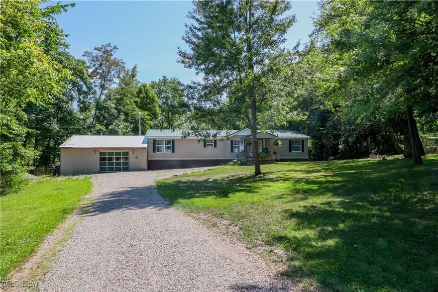 Here is a great opportunity to own a home in a rural area but only minutes from Coshocton. Located on a quiet country road is this beautiful home that has had some updates done and is ready for you to move in and enjoy. Recent updates include a new water pump, new hot water heater, updated flooring, new heat pump and just in general a home that could be yours for now and the future.
A newly surveyed one acre goes with this property and the owner has checked in with the county to attach the mobile home to the real estate and this could be done but would need inspected. Central air will keep you cool as you enjoy the fact that instead of renting you are now the owners of real estate and building equity every day! Affordably priced and ready for your showing today.