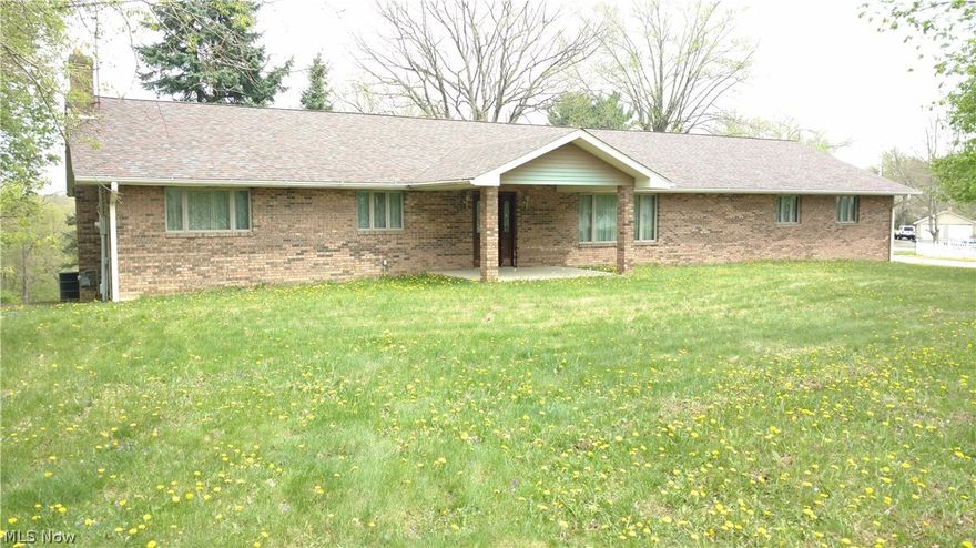 Looking for the perfect brick ranch on 2 acres? Beautiful custom cherry cabinets in the large eat-in kitchen, with appliances. French doors from the kitchen open to the huge wooden rear deck. First floor laundry and half bath is located just off of the kitchen. The walk-out basement also features washer/dryer hook-ups. The home sits on a large 2 acre corner lot, with a beautiful, flat front yard and rolling hills in the rear. The roof is less than 2 years old, high efficiency carrier furnace and AC unit and rheem hot water tank. All kitchen appliances are included. This home is move-in ready! Call today for your private showing.