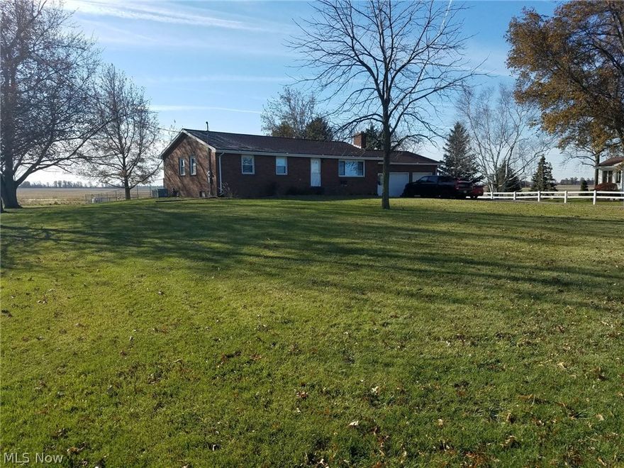 Well maintained brick home has been updated with beautiful stone fireplace, stone kitchen back splash and new flooring in dining area. It offers plenty of parking, newer deck and a heated garage. If you are looking for privacy this home sits on a large lot with views of farm land and nature. There is enough room to possibly build a pole barn and the basement could be finished off to ad another 1400 sq ft of living space. Come see for yourself and let your imagination take over....