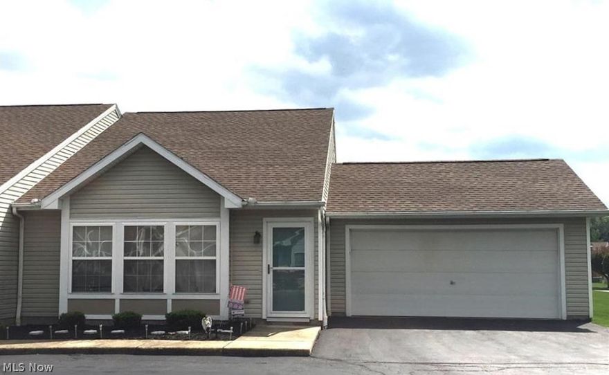 Shows Well!  End Unit Condo with 3 Bedroom, 2 Baths, Newer Flooring, New Windows upstairs, Double Car Garage, Main Bath has Whirlpool Bath, Buyer could buy this Furnished at full price.