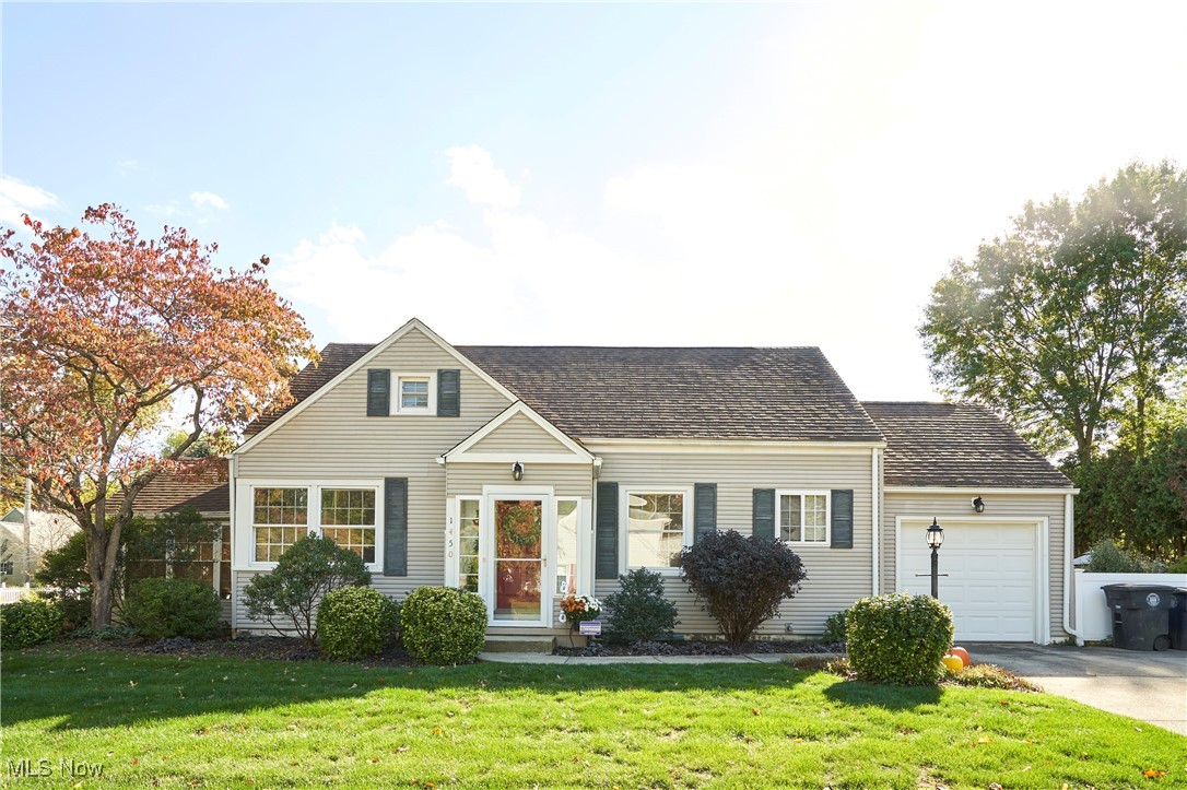 Meticulous  vinyl sided cape cod in West Akron. This is a 3 bedroom 2.5 bathroom home with many updates. The Living Room has newer paint and carpet. The kitchen has been updated with maple cabinets, and newer LVT flooring. Both the cabinets and  and the room have crown molding. On the first floor are 2  bedrooms and updated full bath. The bath has newer vanity and the tub surround was tiled in 2020. Off the living room is a sun porch with carpet and a slider leading to a private patio with a vinyl fence. Upstairs is the master ensuite. The floors are pine wood and the room has recessed lighting. The Master bedroom has a double closet, plus dormer storage.  The master bedroom has a tiled shower and tiled floors. Also on the second floor is an extremely large walk in space for storage, over the garage. The lower is in great shape and has a basic half bath and is ready to be finished. Updates include roof approx 2021 ,Central air approx 2012, 100 amp service, some vinyl windows, concrete drive in approx 2008, plus paint, carpet, and LVT flooring. This home has been lived in very softly and is wonderful to show.