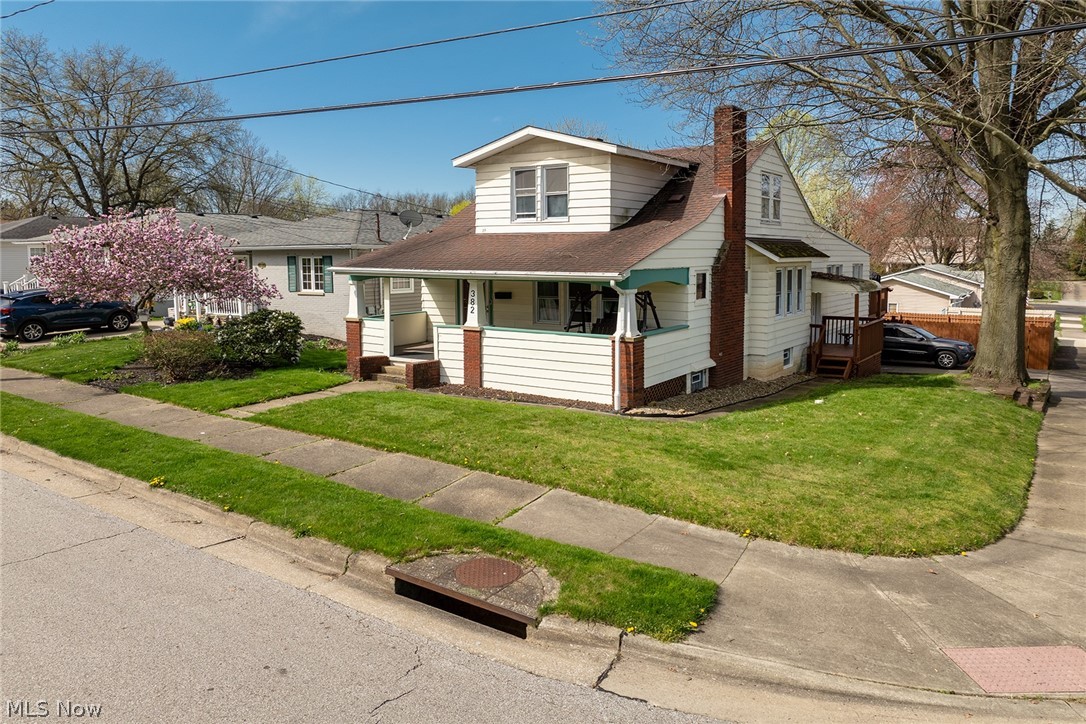 Spacious home with over 1600 square feet! Endless possibilities in this sprawling property. Beautiful woodwork and built ins throughout the first floor. Very large eat in kitchen, 2 first floor bedrooms, full bath, first floor laundry and den that leads to a large back deck. Upstairs are 3 rooms and another full bath, perfect for a primary suite! Full unfinished basement with a 2 car attached garage plus a carport. Fenced in back yard and a wonderful front porch to enjoy the warm evenings. Many improvements throughout the home! Updated windows, high efficiency furnace, updated electric. Don't miss this one!