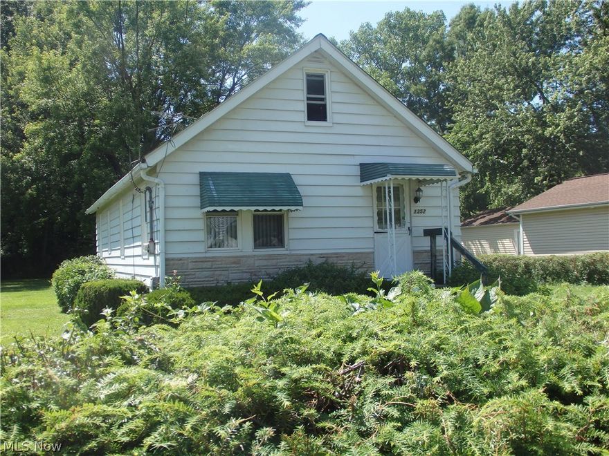 Charming Bungalow situated a picturesque wooded park like double lot (80 x 119). Detached garage. Baseboard heating. Kitchen features eat in area and all appliances stay. Utility room features washer & dryer. Full walk up attic for storage.