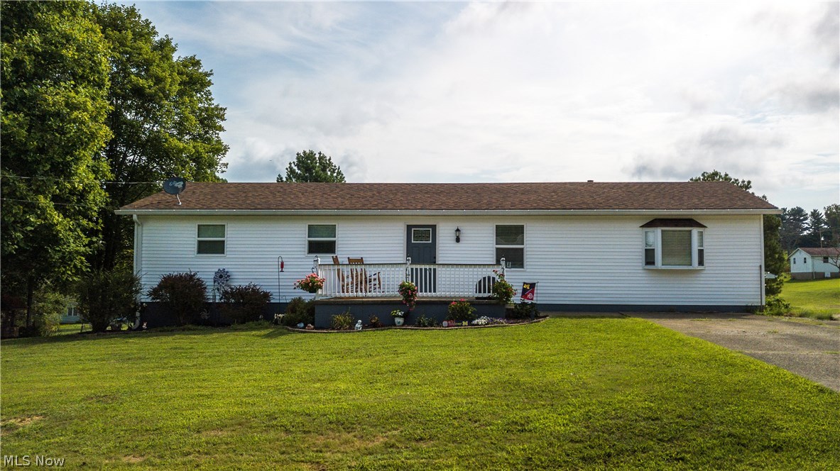 One floor living, open concept and convenient all in one. This 3 bedroom 2 bath home has a large back yard, double detached garage, Large Family Room, updated kitchen, engineered Mahogany Wood floors, bathrooms have been updated, and may qualify for NO MONEY DOWN financing. Major renovations have this home looking like new.