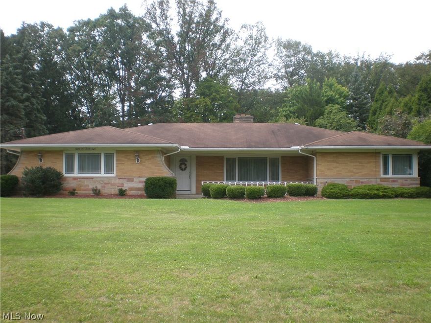Amazing Brick Ranch home on 1 1/2 acres with a spectacular Park Like View! Large room sizes! A Full Basement is partially finished with an additional kitchen! Interior is freshly decorated! Large room sizes! All appliance and window treatments are included! Extra wide and deep garage is 750 square feet! home features an attached Sun room for a beautiful view of wildlife and nature at it's finest!