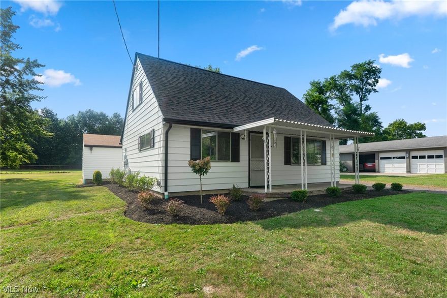 Immediate possession on this Wonderful Move-in ready Cape Cod Home sitting on a large scenic lot with many updates. Detached 2 car garage and attached shed for plenty of storage. Bedrooms: 3 (1 on the main level, 2 on the second level. 1 full updated first floor bathroom. Main Floor: Kitchen, dining area, living room, laundry, bedroom, full bath. All appliances stay including the washer and dryer. New septic system 2024. New landscaping. New roof, gutters & drain in back yard 2023. New Hot water tank.  Brand new carpeting in bedrooms. Brand new flooring. Freshly painted exterior and interior. Covered front patio. Come check out this adorable home that comes with a 1 year home warranty!