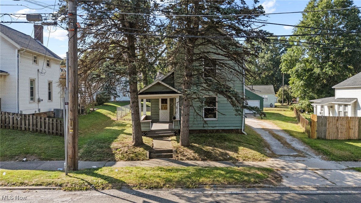 Welcome home to 1450 Wooster Rd in Barberton! This is a 3 bed 1.5 bath two story home ready for your personal touches. Large lot and 2 car garage too! Roof is from 2022. Furnace is from 2022. Bring your decorating ideas and move right in! Call your favorite Realtor today before it's too late!