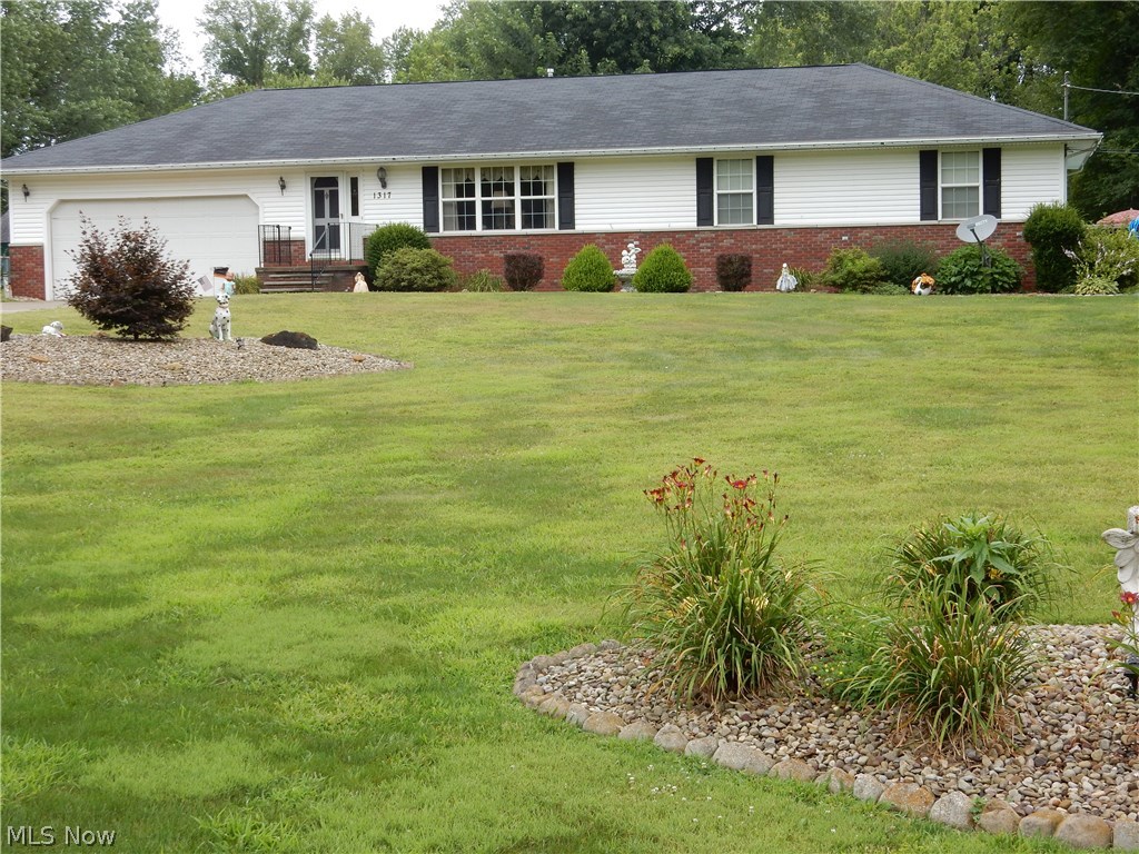 Wonderful custom built ranch on nearly 3/4 acre corner lot. There is so much to offer the growing family in this beautifully cared for one owner home. This house is handicap accessible throughout the main level and offers a semi-open floor plan. Fall in love with the spacious kitchen which offers plenty of cupboard space, a brand new tile floor and built-in breakfast bar. Just off the kitchen is a sizable dining room which fits a large table and flows nicely into the well lit spacious living room. Also on the main floor are 2 amply sized guest bedrooms and a Master big enough to accommodate large furniture. The main floor bathroom is HUGE! You will find a jetted tub and free standing shower, vanity area and nice double sink. There is an over-sized family room in the basement that is a great place to host parties. The bar area has a frig. and there is a large full bath. This basement is sprawling, it also offers plenty of space for storage. Out side, this home sits well off the street with plenty of parking in the concrete drive and offers a large fenced back yard that is the perfect place to entertain. You'll love the pool w/ decking, fire pit, deck and patio. Plus there is still plenty of yard for playing. You will also find a great storage shed in the back yard. This home is being offered with a one year home warranty for the buyer's peace of mind. Don't hesitate with this one, it is priced to sell and won't last in this market. Contact me for a private showing.