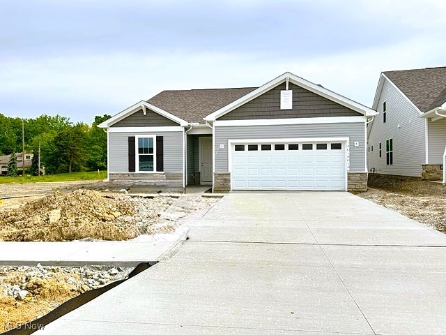 Our Summer ready Quick Move-In Ranch home is a beautiful one-story home design. The Mystique floor plan offers 3 bedrooms and 2 full baths, well-suited for families and empty nesters alike. The open-concept layout is inviting and bright with an abundance of large windows and high ceilings throughout the home. The beautiful kitchen includes a center island that overlooks a bright gathering room, perfect for entertaining and everyday living. The gathering room features a cozy fireplace and a wall of windows for a serene view of your professionally landscaped backyard. Your designer kitchen is the focal point of the home with a built-in gas range and hood ventilation, stainless steel whirlpool wall oven and appliances, elegant 42” maple cabinets with soft-close doors and drawers, and sleek quartz countertops. Luxury vinyl plank flooring flows through the home for a stylish, durable finish – perfect for quick clean-ups and your lock and go lifestyle. Step outside onto the wraparound covered patio - perfect for morning coffee, sunset cocktails, or just lounging with a good book or entertaining family and friends! Additional highlights include an extra deep garage with an expanded area ideal for extra storage or third car and a low-maintenance lifestyle with lawn care and snow removal included. Located in the highly sought-after Port West community. With very limited opportunities to own a Ranch style home in Avon Lake, if you dream of owning a Ranch home or need a Primary on the main level this is THE home for you! Call today – you don’t want to miss out!